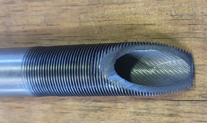 Low fin tubes with internal rifling